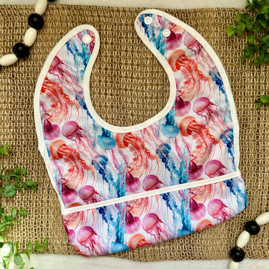 Jelly Bloom Flip Pocket Bib